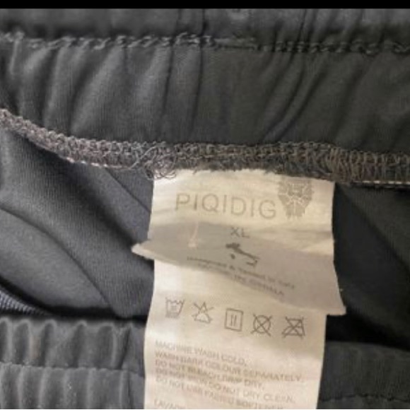 Piqidiq basketball shorts,gently used with zipper pockets and drawstring waist. - Picture 2 of 4